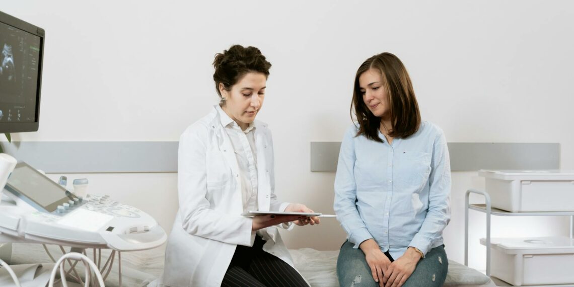 Photo Of Pregnant Woman Having A Consultation