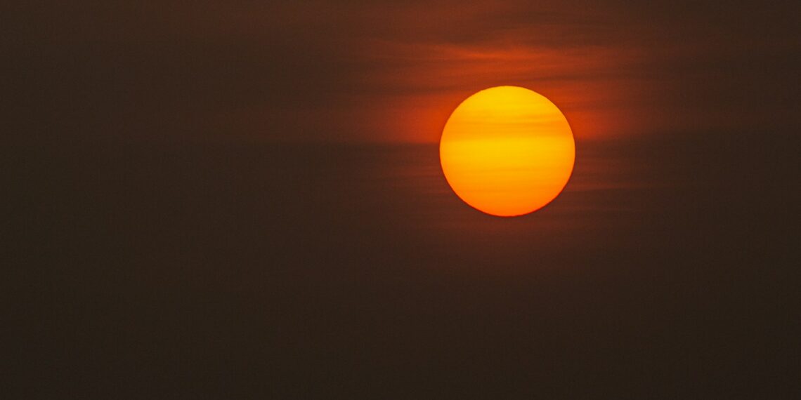 low-light photo of sun