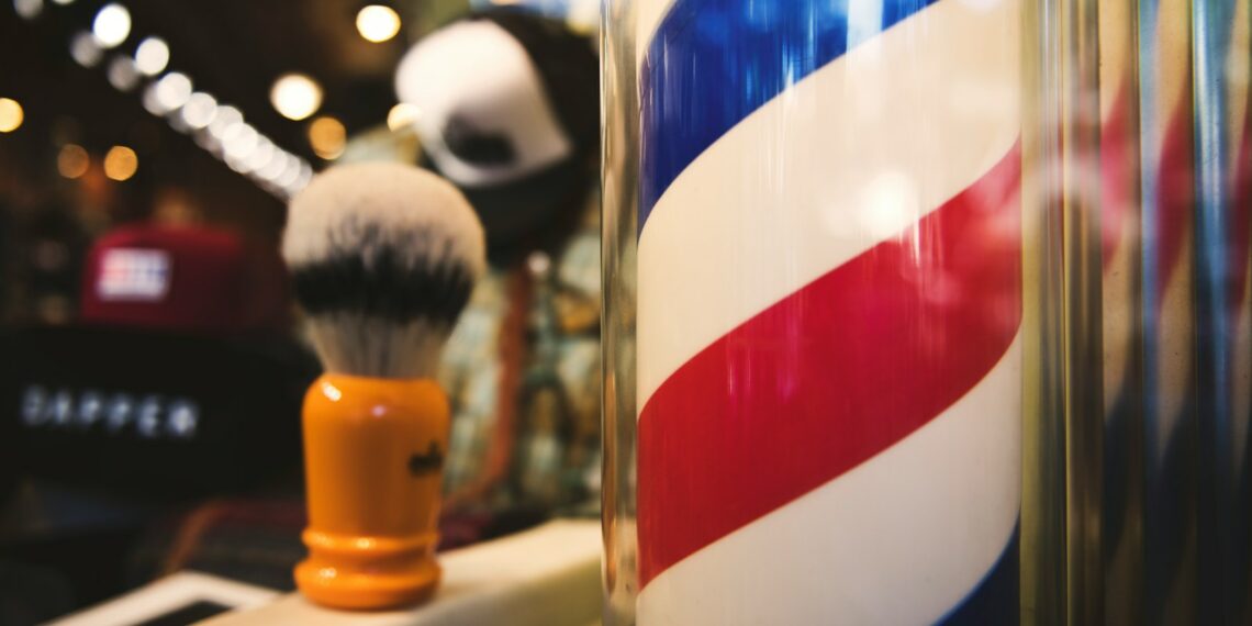 white, red, and blue barber spiraling bar